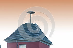 Flashes over a small tower with Air Raid Siren