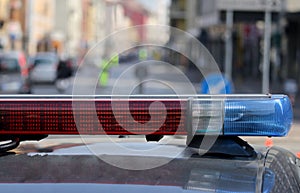 Flashing sirens of the police car at the checkpoint