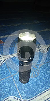 Flashlight bright light dissipate darkness photo