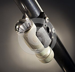 Flashlight under a shotgun barrel