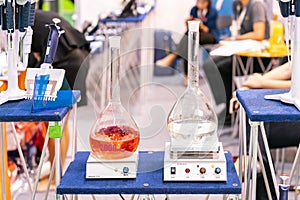 Flask or vials circular for solution liquid on automatic stir or magnetic stirrer vortex mixer & hot plate device of lab photo