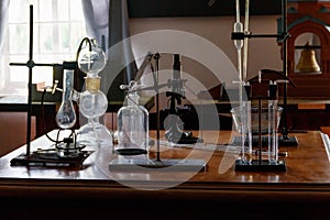 Flasks and chemical equipment in old laboratory