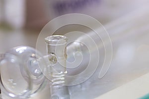 Flasks close up equipment in laboratory background