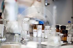 Flasks with liquids in a lab, pharmaceutical industry factory and production laboratory, chemistry concept