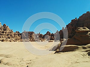 Surrounded by hoodoo rock formations in Goblin Valley