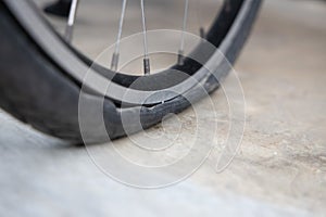 Flat Bicycle Tire on the Street