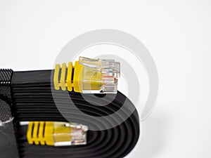 Flat black network cable on a white background.