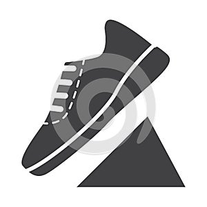 Flat black running shoes icon