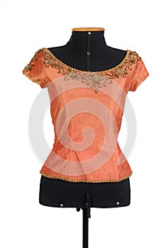 Flat blouse closeup vintage style embroidery handmade luxury dress shiny fabric orange product made by a seamstress online custom photo