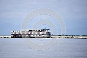 Flat bottom boat for tourism holiday on River Assam in India, Asia