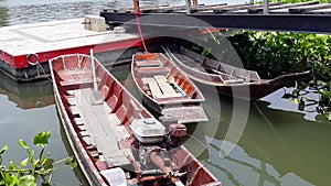 Flat bottom boats on Thai river