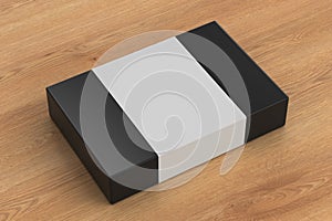 Flat box mock up with blank paper cover label: Black gift box on wooden background