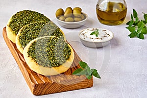 Flat bread with zaatar, arabic manakeesh and labaneh