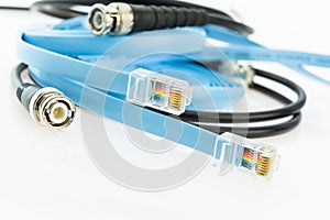 flat console cables RJ45 and old BNC coaxial network cable photo