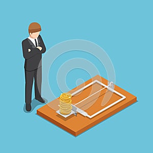 Isometric businessman looking at dollar coin on mousetrap. photo