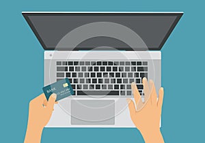 Flat design illustration of laptop and hand holding credit card for online internet shopping, vector