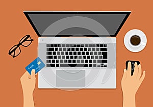 Flat design illustration of office workspace with laptop, hands holding computer mouse and credit card. Cup of coffee and glasses