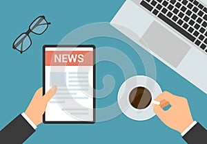 Flat design top view of office workspace. Hands of manager holding tablet with newspaper, cup of coffee and laptop, vector