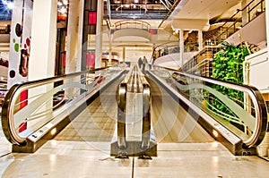 Flat empty escalator in the shopping mall