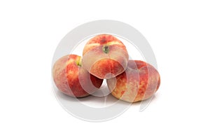 Flat or flattened peach on a white background