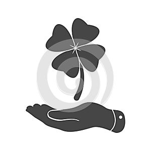 Flat hand showing clover with four leaves sign icon on a white