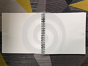 Flat lay 2 blank pages of the note book for message