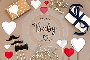 Flat Lay With Accessories, Gifts, Hearts, Text Welcome Baby