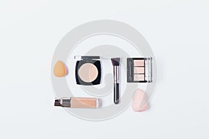 Flat lay arrangement of complexion makeup products