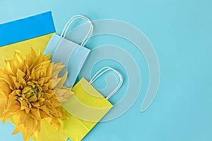Flat lay background in the colors of the flag of Ukraine, copy space.