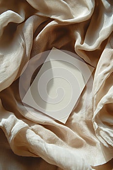 Flat Lay of Blank Art Card with Soft Neutral Textures photo