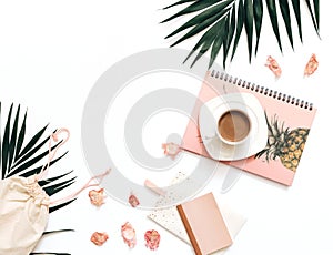 Flat lay blogger workspace mockup with tropical leaves