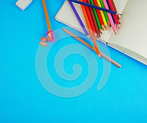 Flat lay blue desk with stationery