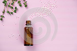 Bottle with white sugar pills