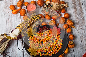 Flat lay of candy corn and fall decorations