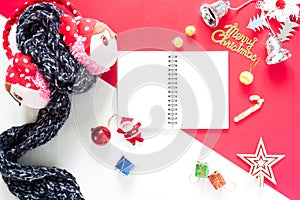 Flat lay of Christmas Decoration gift boxes and empty notebook t