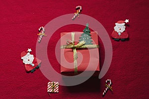 Flat Lay Christmas Gift Box on Red Background.