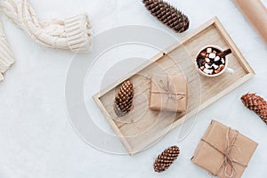 Flat lay christmas gift, hot cocoa and decoration