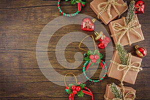 Flat lay Christmas ornaments on wooden background
