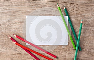flat lay colored pencils and paper stationery