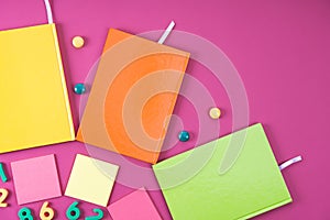 flat lay with colorful notebooks and appliances