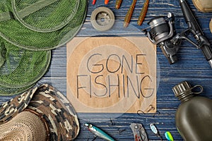 Flat lay composition of angling equipment photo