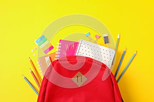 Flat lay composition with backpack and school supplies