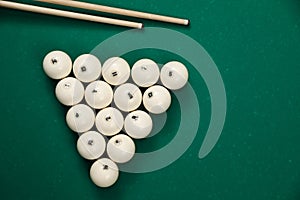 Flat lay composition with balls on billiard table