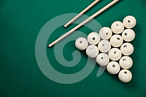 Flat lay composition with balls on billiard table