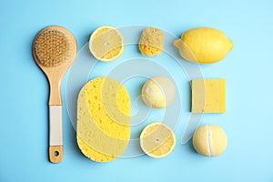 Flat lay composition with bath bombs, toiletries and lemons