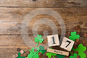 Flat lay composition with block calendar on background, space for text. St. Patrick`s Day celebration
