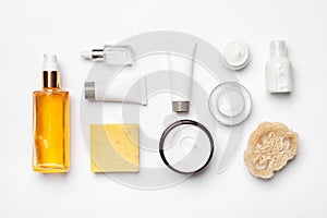 Flat lay composition with body care products on white