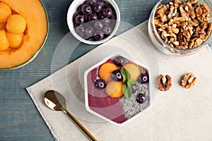 Flat lay composition with bowl of tasty acai