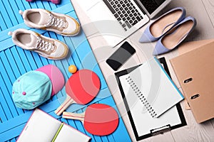 Flat lay composition with business supplies and sport equipment on color background. Concept of balance between work and life