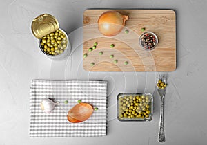 Flat lay composition with canned green peas